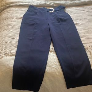 Top shop trousers with belt detail and front pleat.